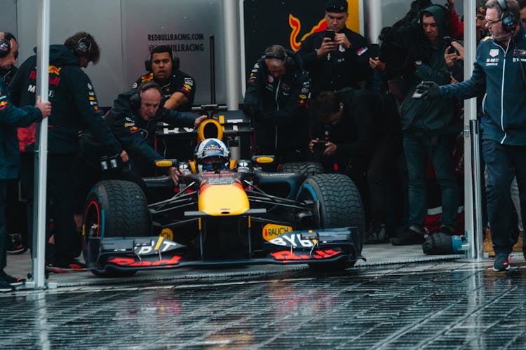 Racing Team With Their Racing Car