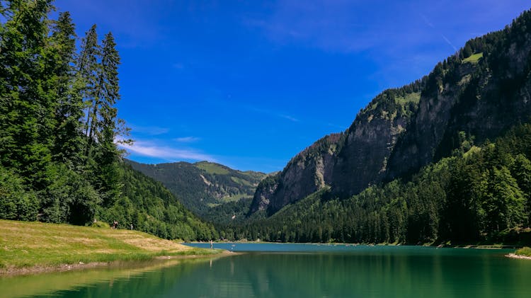 Scenic View Of The Green Mountains And The Lake