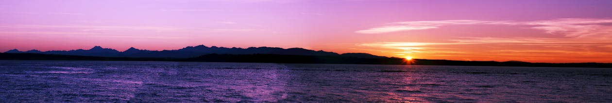 Kostenlos Panorama Fotografie Des Meeres Bei Sonnenuntergang Stock-Foto