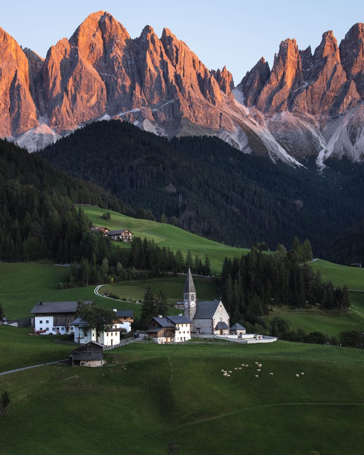 Castle In Green Valley Near Rock Mountains