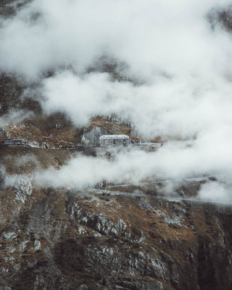 Hotel In Mountains In Clouds