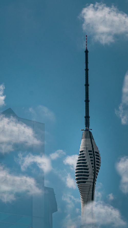 Free Vertical shot of Camlica Tower in Istanbul, Turkey, against a bright blue sky with clouds. Stock Photo