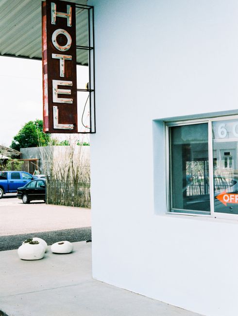 Rustic hotel sign in Marfa, Texas with retro aesthetic. Perfect for travel themes.
