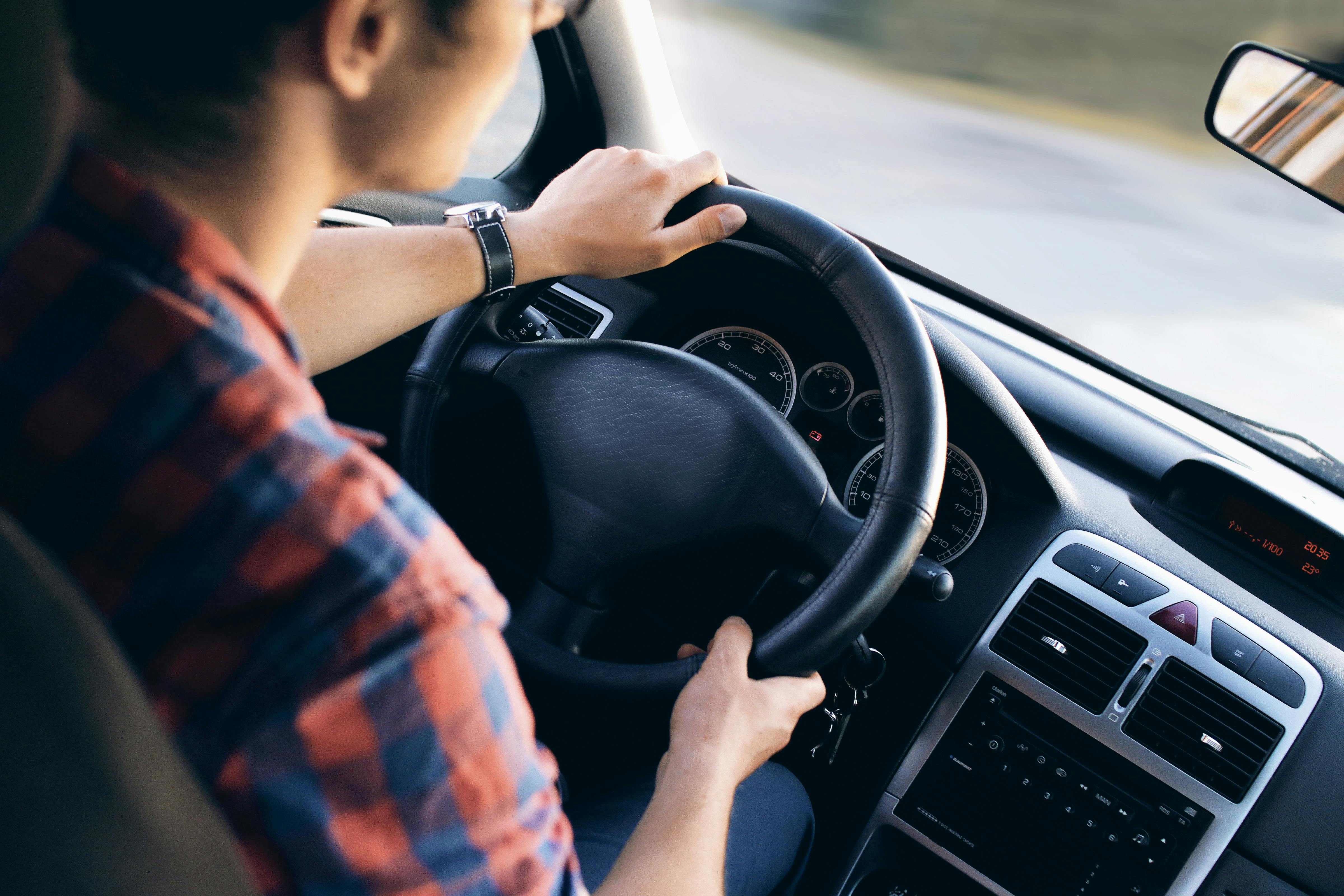 A man inside the vehicle. | Photo: Pexels