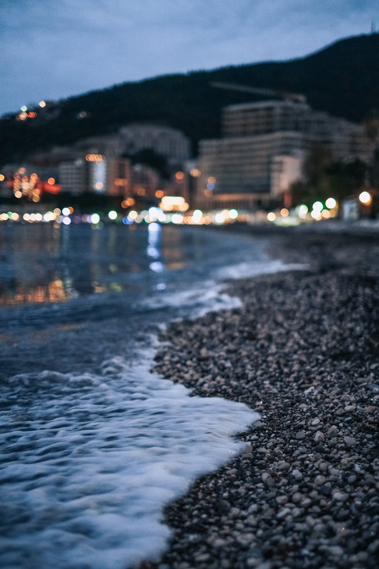 Close-Up Photo Of A Sea Foam On Shore