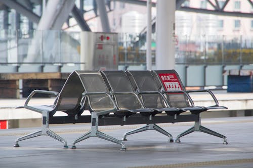 Public Seating Chairs on Train Station Waiting Area