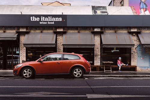 Car Parked in Front of a Restaurant