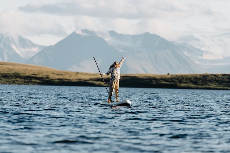 Woman On Paddle Board