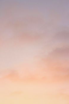 A serene and colorful sunset sky featuring soft pastel hues, perfect for nature and sky-themed content.