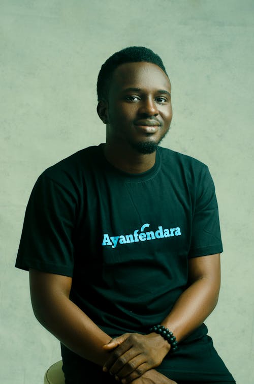 Young Man on Grey Studio Background