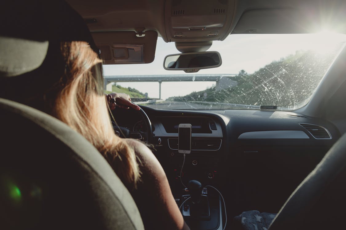 A woman driving a car