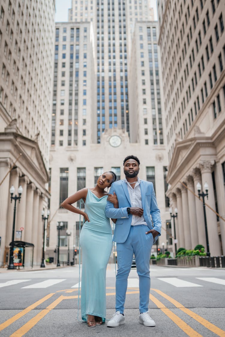 Couple Posing Near Old City Buildings 