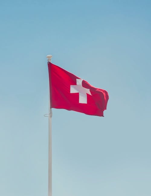 Switzerland National Flag Hanging on Pole