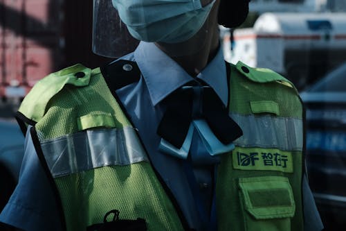 Close-up on Vest of Police Officer