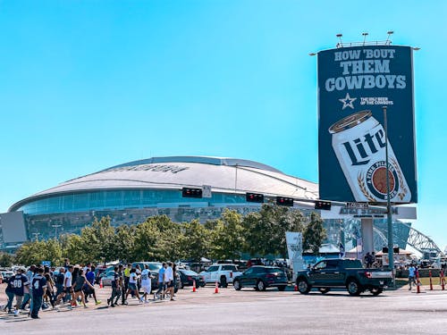 People Walking to the Stadium