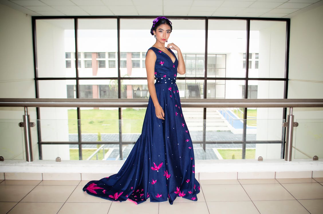 Free Woman Wearing Blue Floor Length Gown  Stock Photo