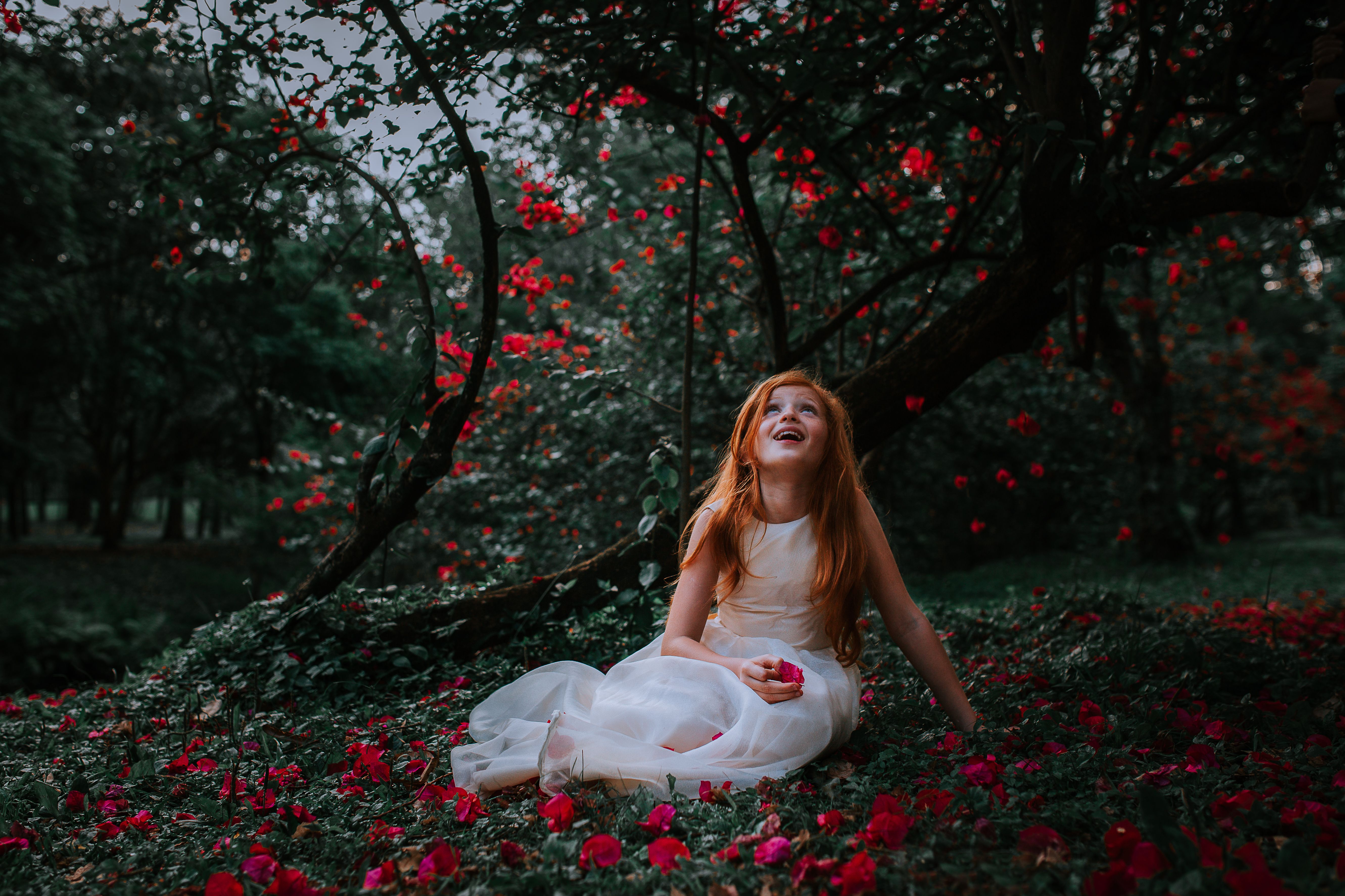 Woman in White Dress Sitting on the Ground · Free Stock Photo