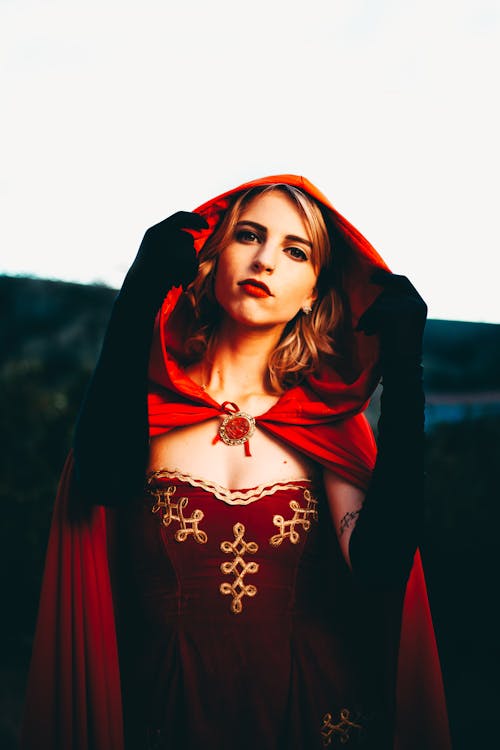 Portrait of a Beautiful Woman in Red Hood Cape