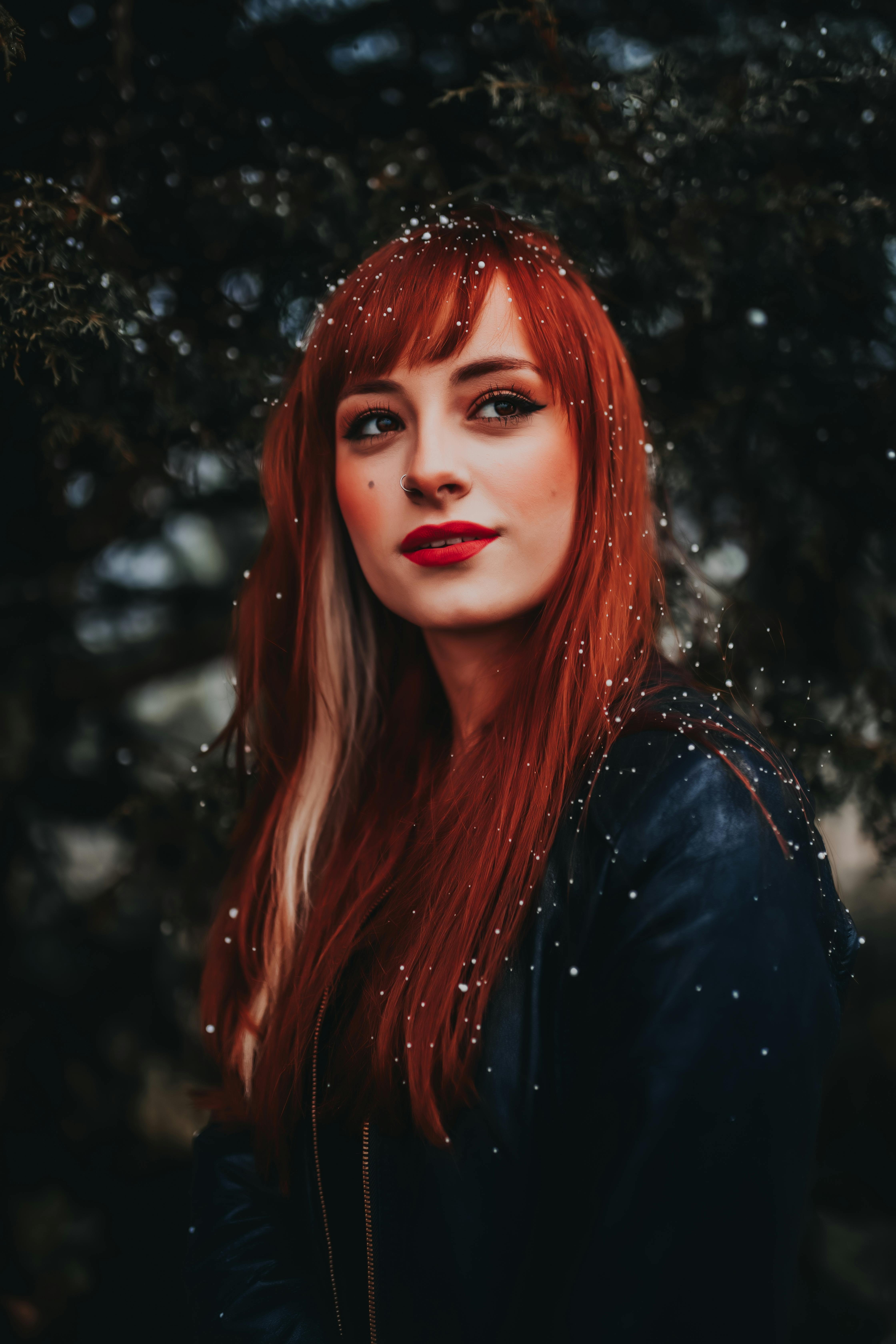 redhead-woman-posing-outside-in-winter-free-stock-photo