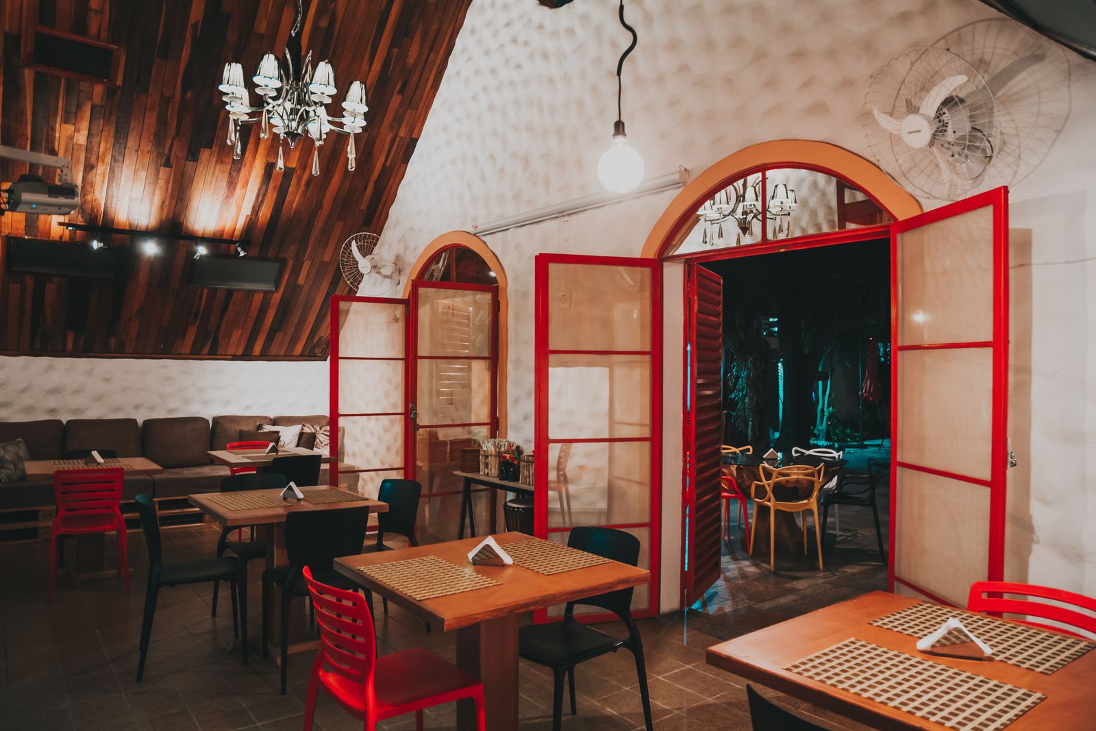 Warm premium restaurant interior with wooden details and soft lighting