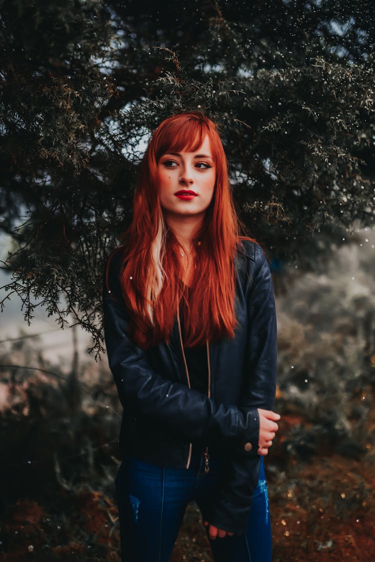 Redhead Woman Posing Outside In Winter 