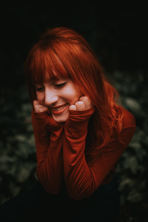 Young Redhead Woman with a Nose Piercing 