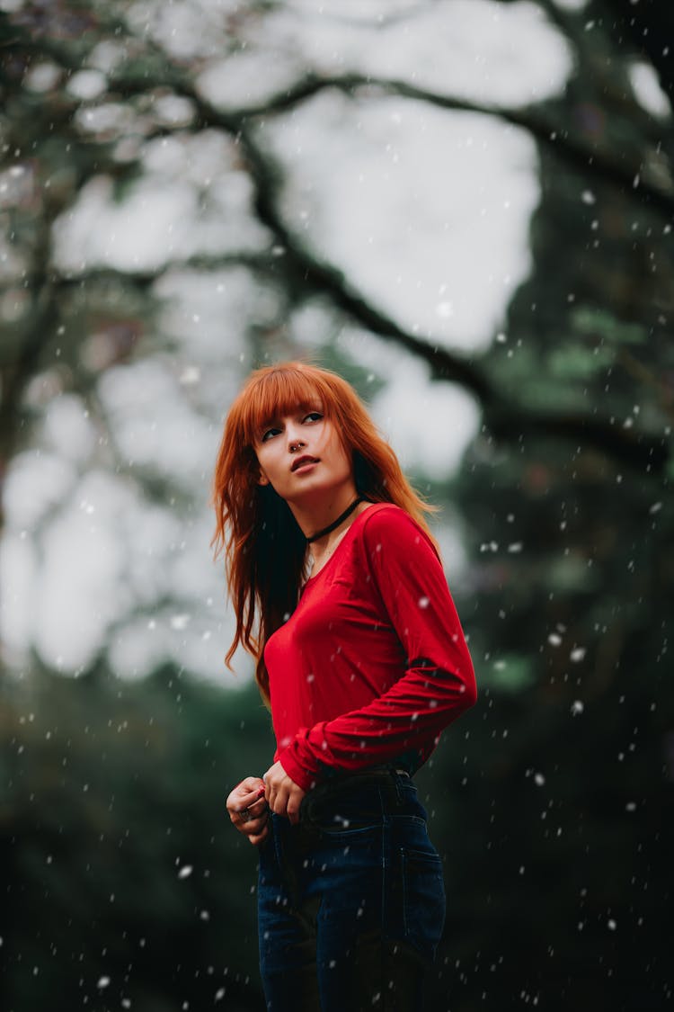 Redhead Woman In A Forest At Snowfall 