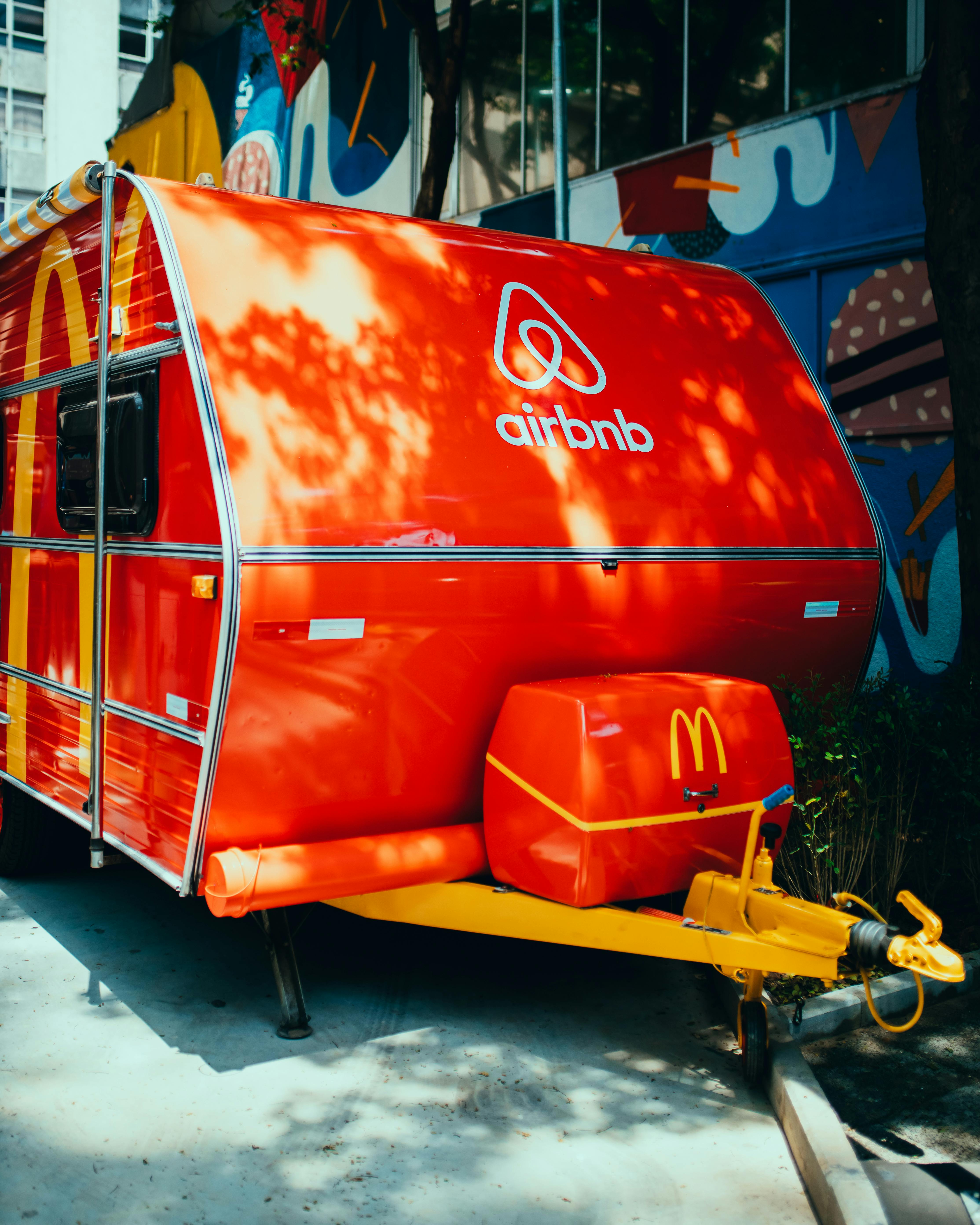 a red and white mcdonald food truck