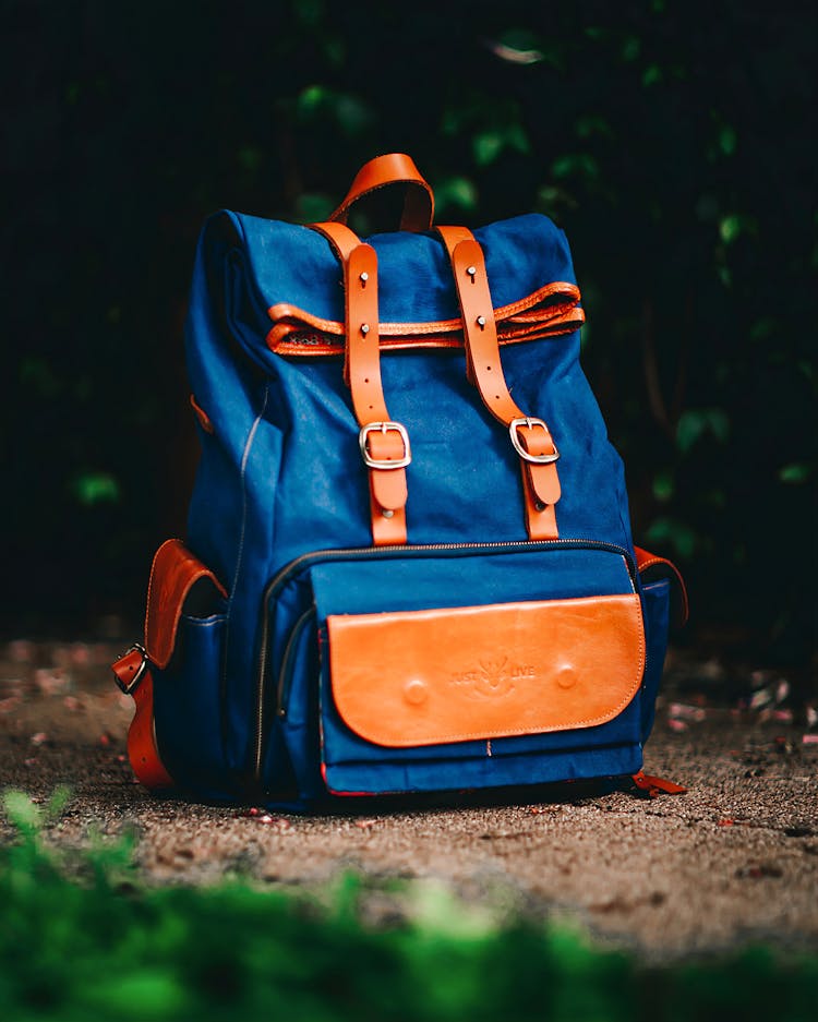 Blue Backpack On The Ground