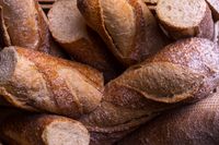 Crusty baguettes in a basket, photo by Ivan J. Long on Pexels