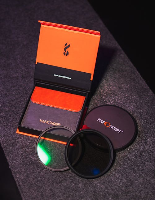 Free Camera Filters with Orange Packaging Stock Photo