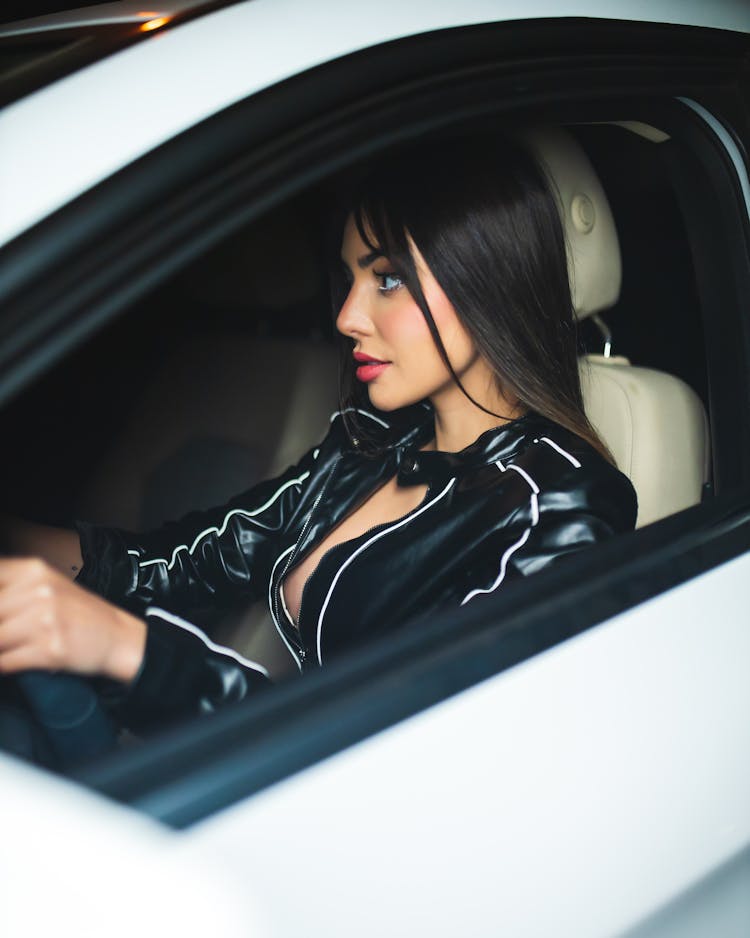 Woman Sitting In Car