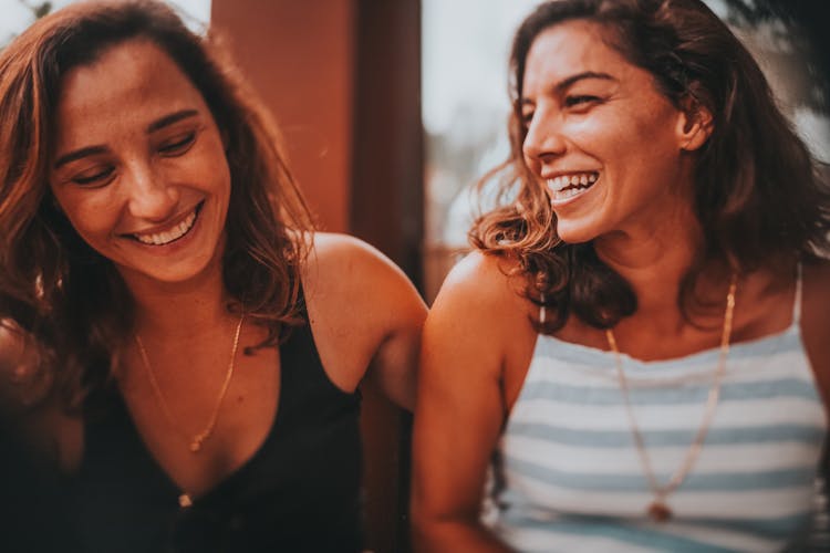 Faces Of Laughing Women