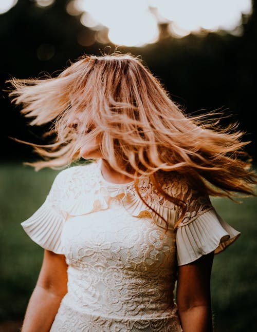 A Woman in White Lace Shirt