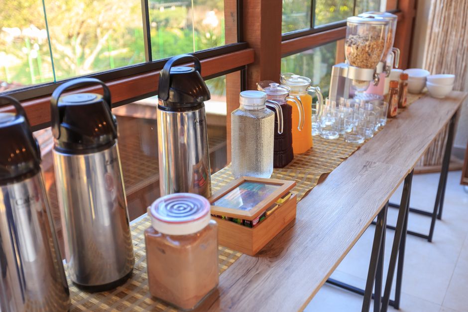 image of a well-stocked coffee station with various syrups, creamers, and snacks - office coffee service image of a well-stocked coffee station with various syrups, creamers, and snacks - office coffee service