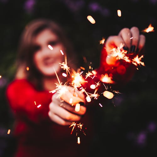 Woman Holding Sparklers