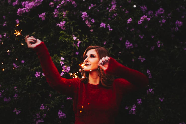 Woman Holding Sparklers