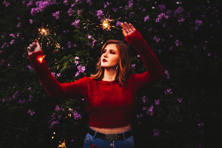 Woman Holding Sparklers