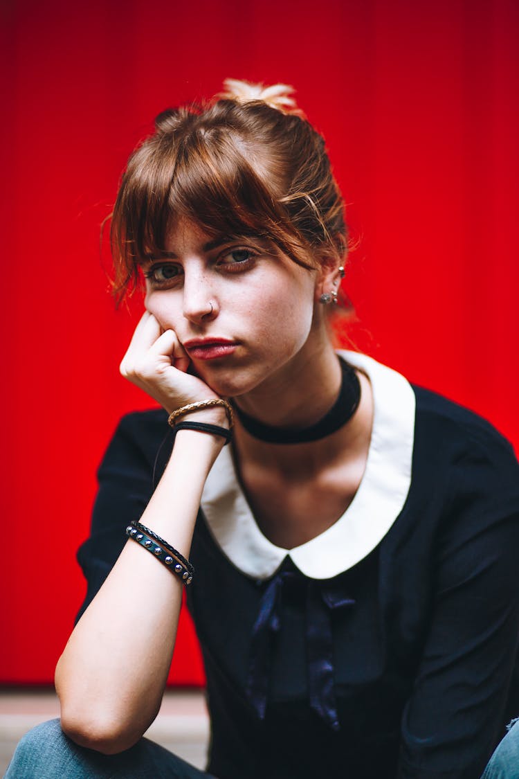 Teenage Girl Model Sitting In School Shirt And Jeans