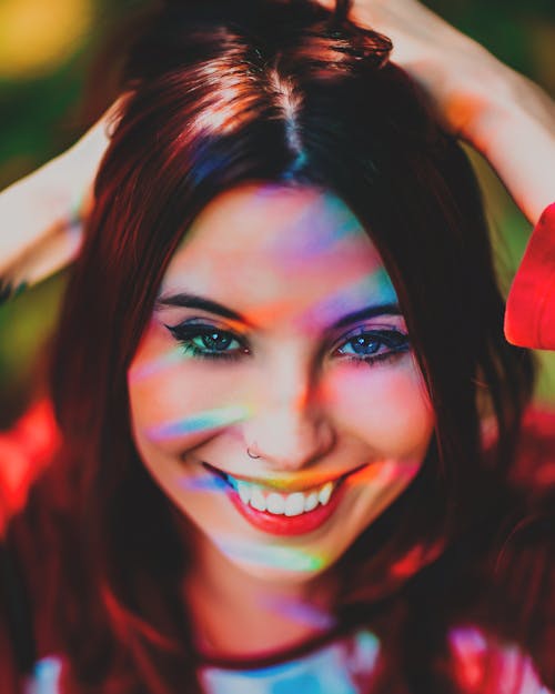 A Woman Smiling with Nose Piercing