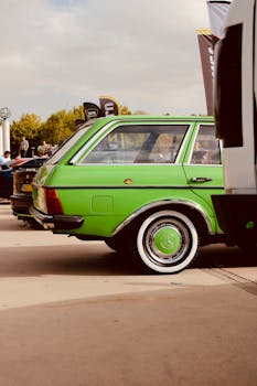 A classic green Mercedes-Benz station wagon parked outdoors in Turkey, showcasing nostalgic design.