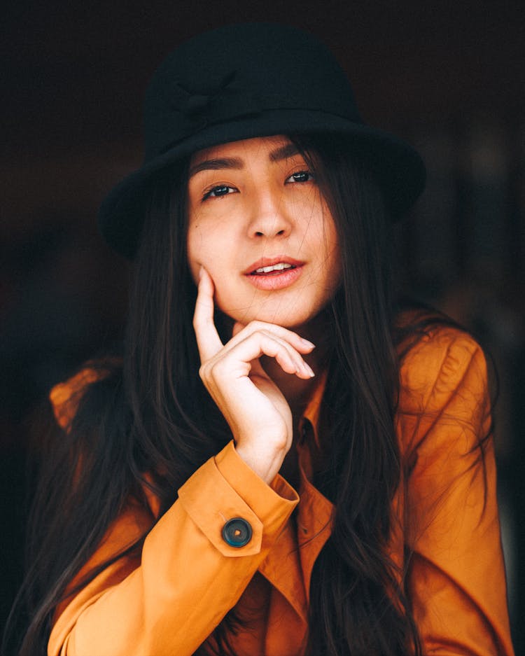 Young Brunette Woman In A Hat