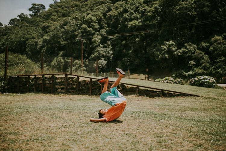 Photograph Of A Kid Falling