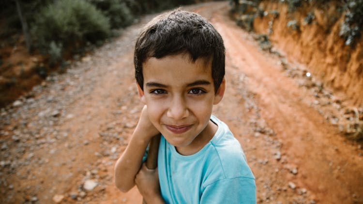 Boy's Face In Close Up Photography