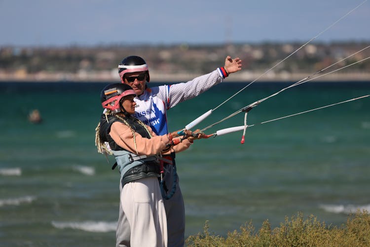 Instructor Talking To A Kiteboarder