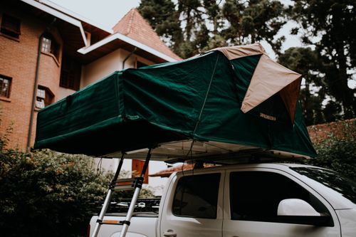 Photo of a Tent on the Roof of a Car · Free Stock Photo