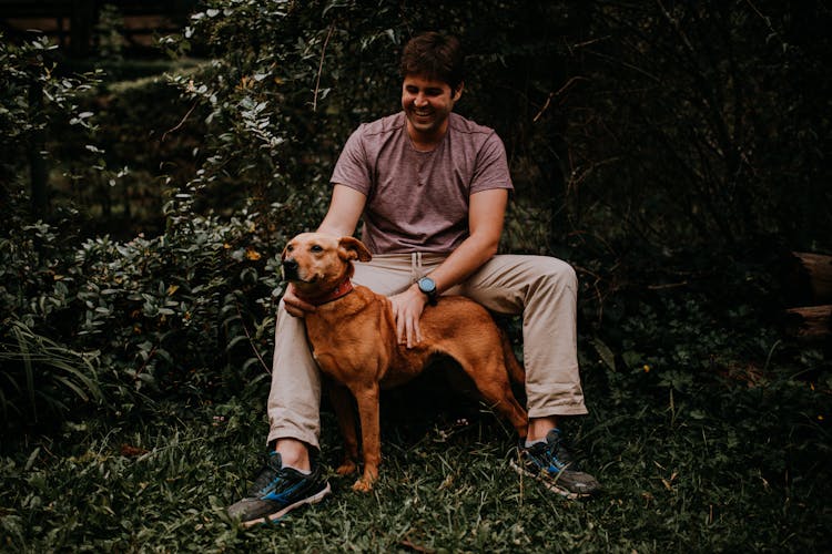 Sitting Man With Dog