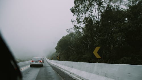 Cars on a Highway and Fog