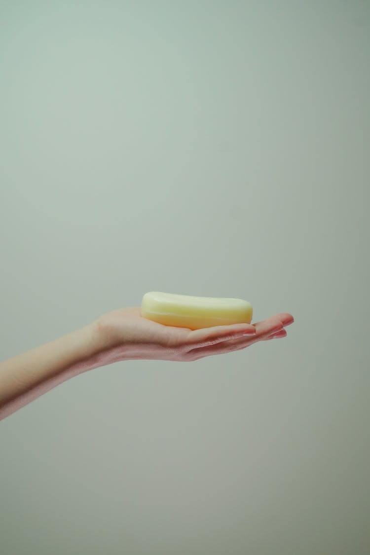 A Bar Of Soap On A Hand