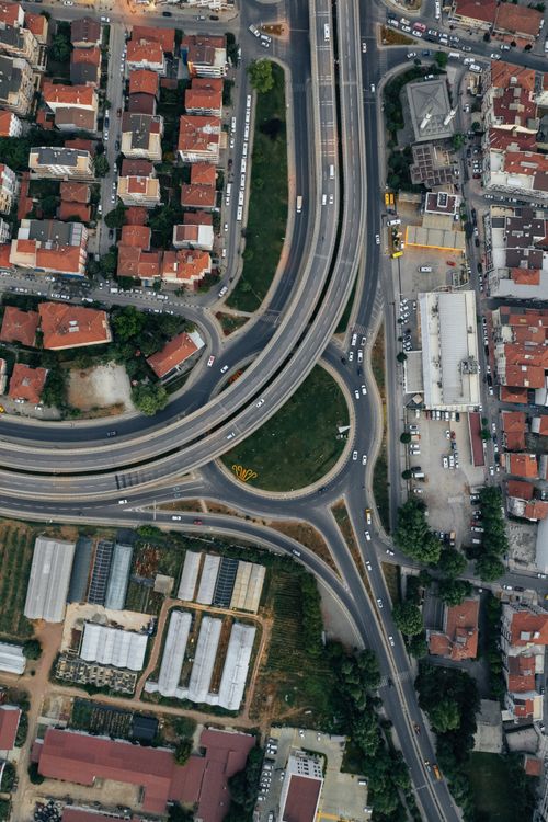 Aerial View Of Roads And Buildings In City Free Stock Photo aerial-view-of-roads-and-buildings-in-city-free-stock-photo